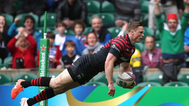 Chris Ashton of Saracens dives over for the first try during the Heineken Cup semi final match between Saracens and Clermont Auvergne