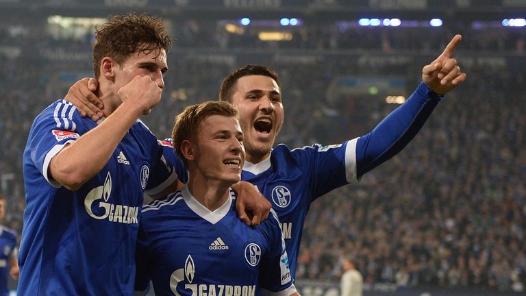 Schalke's midfielder Max Meyer (C), Schalke midfielder Leon Goretzka (R) and Schalke defender Sead Kolasinac celebrate 