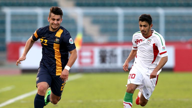 MUSCAT, OMAN - JANUARY 14:  Petros Skapetis (L) of Australia compete for the ball with Eshan Pahlavan of Iran during the AFC U-22 Championship Group C matc