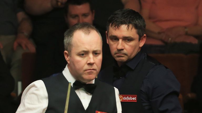 SHEFFIELD, ENGLAND - APRIL 21:  John Higgins of Scotland in action against Alan McManus of Scotland during day four of the The Dafabet World Snooker Champi