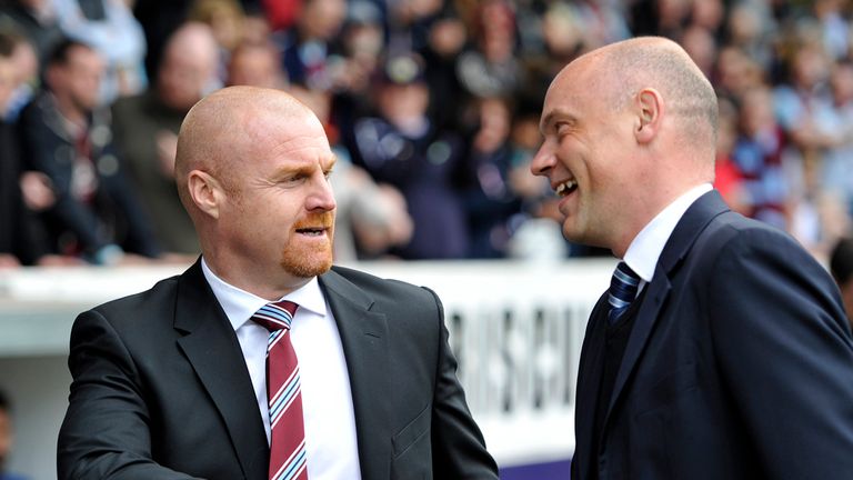 Burnley's manager Sean Dyche (left) and Wigan Athletic's manager Uwe Rosler during the Sky Bet Championship match at Turf Moor, Burnley.