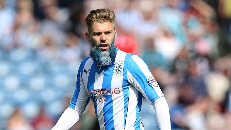 Huddersfield Town's Adam Clayton with a blue and white beard during the Sky Bet Championship match at the John Smith's Stadium, Huddersfield.