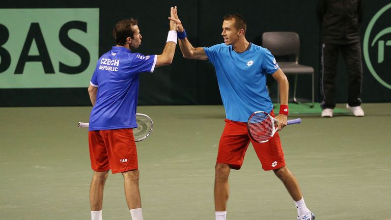 Radek Stepanek and Lukas Rosol of the Czech Republic react during their doubles match against Yasutaka Uchiyama and Tatsuma Ito in Davis Cup action.