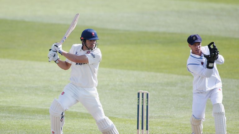 CHELMSFORD, ENGLAND - APRIL 14:  Alastair Cook of Essex hits out watched by Derbyshire wicketkeeper Richard Johnson during day two of the LV County Champio