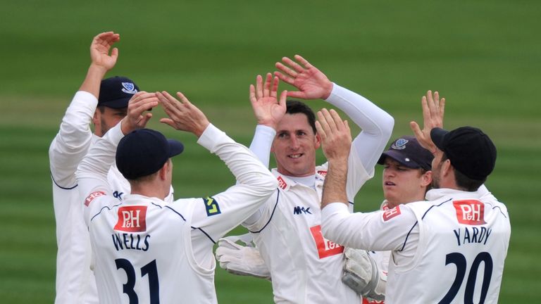 HOVE, ENGLAND - APRIL 06: Jon Lewis of Sussex celebrates the wicket of David Malan of Middlesex with his team mates during the LV County Championship betwe
