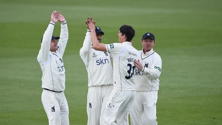 NOTTINGHAM, ENGLAND - APRIL 27: Chris Wright of Warwickshire is congratulated on the wicket of Phil Jaques of Nottinghamshire during day one of the LV Coun