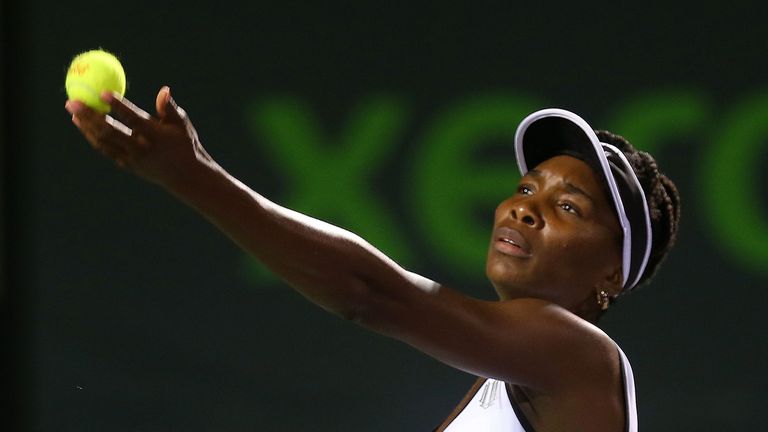 Venus Williams serves to Dominika Ciblukova of Slovakia during their match on March 24, 2014 in Key Biscayne, Florida.  