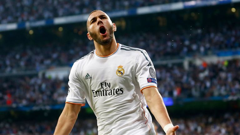 Real's Karim Benzema celebrates scoring the opening goal during a  Champions League semifinal first leg soccer match between Real Madrid and Bayern Munich