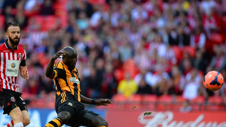Yannick Sagbo of Hull City scores their first goal during the FA Cup with Budweiser semi-final match between Hull City and Sheffield United