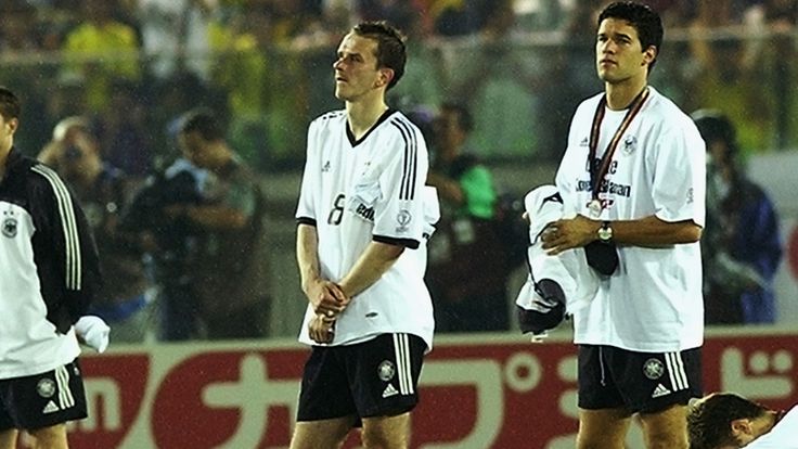 A dejected Germany team after the World Cup final against Brazil in Yokohama, Japan