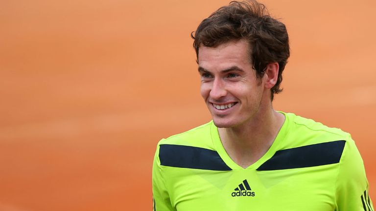 - Andy Murray of Great Britain smiles as happy birthday rings round the stadium after he defeated Jurgen Melzer of Austria