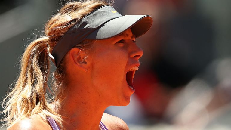 - Maria Sharapova of Russia celebrates winning the second set against Na Li of China in their quarter final match during day seven of the Mutua Madrid Open tennis tournament