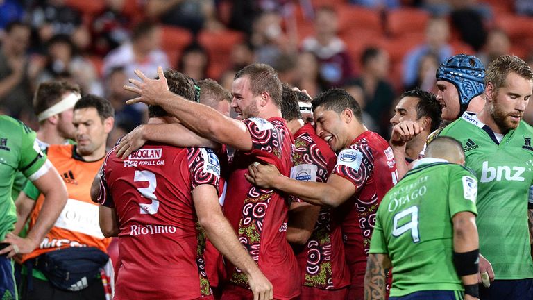The Reds celebrate against the Highlanders