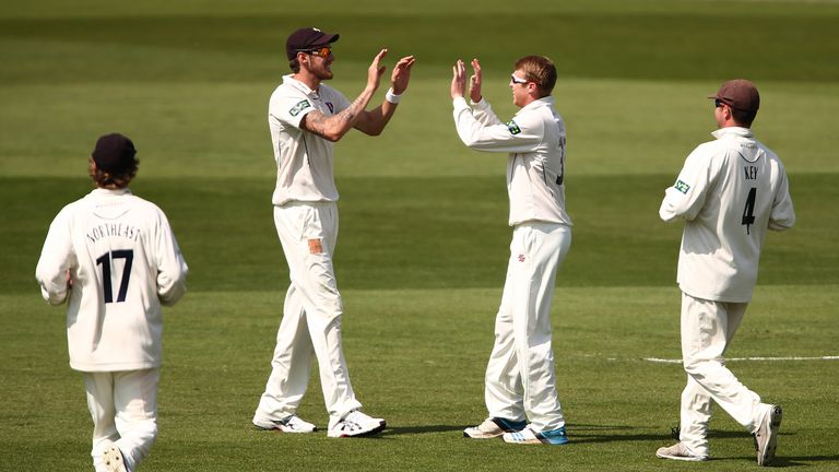 Adam Riley of Kent celebrates with Ben Harmison after claiming a wicket in the LV= County Championship clash with Surrey at the Oval