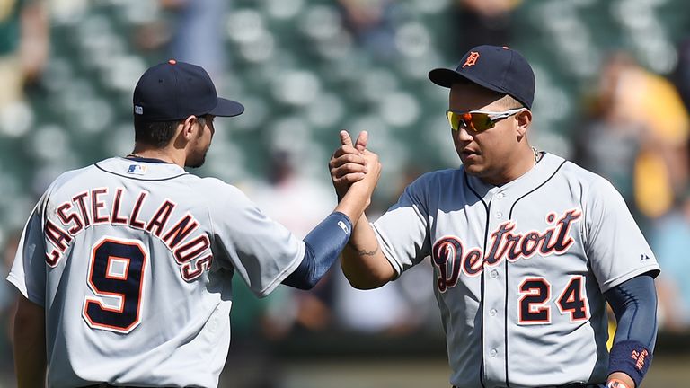 Miguel Cabrera and Nick Castellanos celebrate defeating the Oakland Athletics