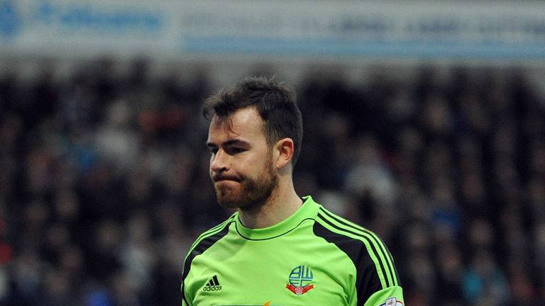 Bolton goalkeeper Andy Lonergan in action against Blackpool
