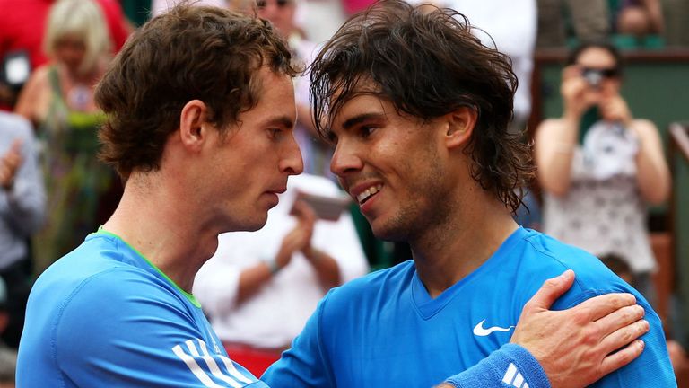 Rafael Nadal is congratulated by Andy Murray following his victory during the men's singles semi final match at Roland Garros in 2011