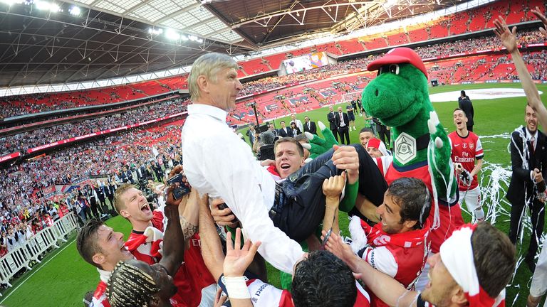Arsene Wenger celebrates after the FA Cup Final between Arsenal and Hull City at Wembley Stadium on May 17, 2014 in London, England.