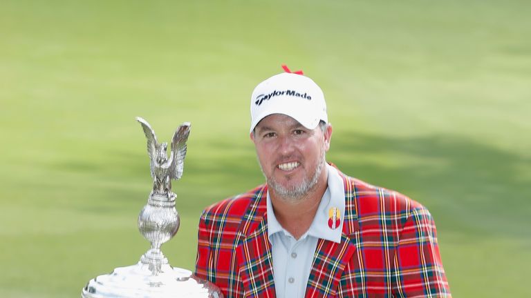 Boo Weekley poses with the trophy after his one-stroke victory last year