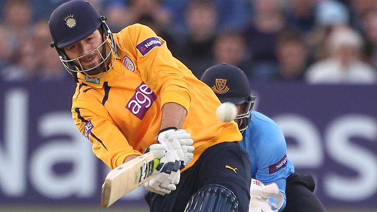  James Vince of Hampshire hits out while Ben Brown of Sussex looks on during the Natwest T20 Blast match between Sussex Sharks and H