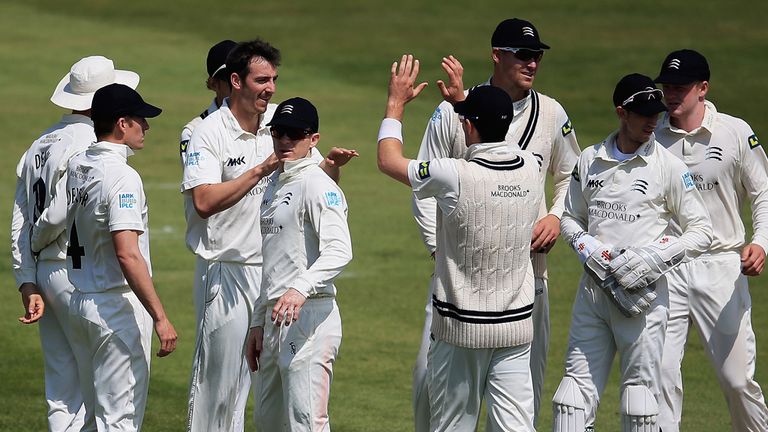 Middlesex's Toby Roland-Jones celebrates the wicket of James Middlebrook