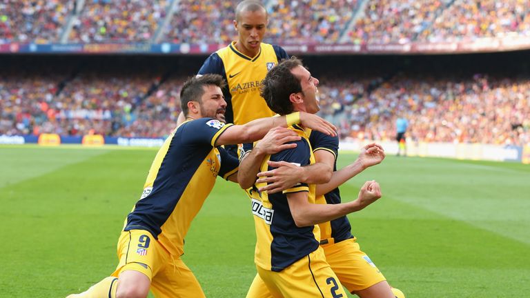 Diego Godin of Atletico de Madrid celebrates after scoring his goal during the La Liga match at FC Barcelona 