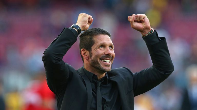 Diego Simeone the coach of Club Atletico Madrid celebrates towards his supporters after winning the La Liga after the match with Barcelona