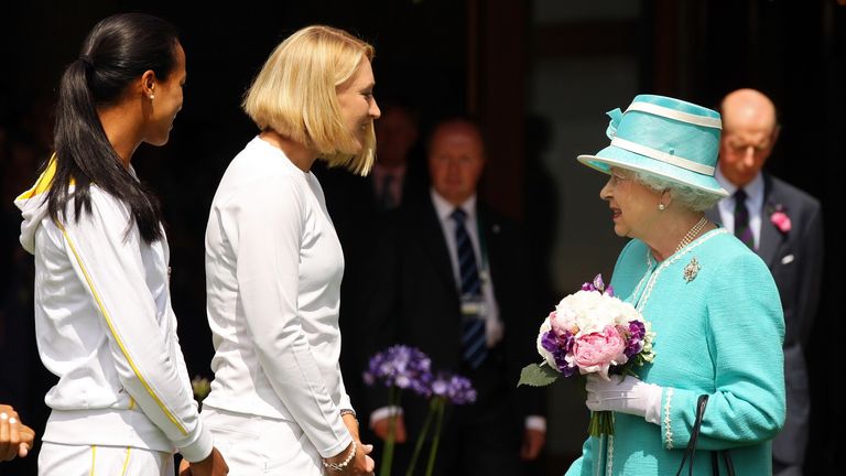 Queen Elizabeth II (2nd R) meets Anne Keothavong (L) and Elena Baltacha (2nd L) during a visit to 2010 Wimbledon 