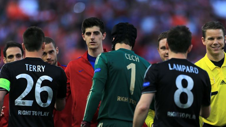 Atletico Madrid goalkeeper Thibaut Courtois (centre left) prepares to shake the hands of Chelsea goalkeeper Petr Cech (1) and Frank Lampard (8)