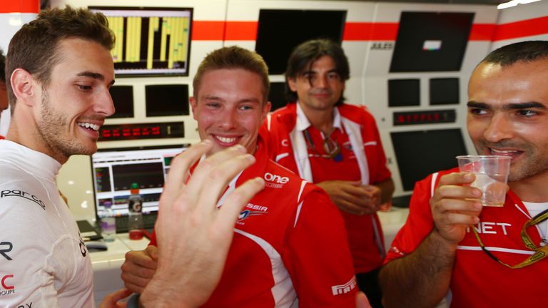 Jules Bianchi celebrates his and the team's first F1 points
