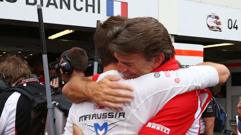 Jules Bianchi celebrates with Graeme Lowdon