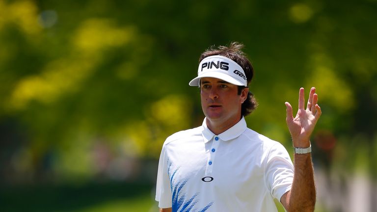 Bubba Watson waves to the gallery after making a birdie on the second hole during the third round of the Memorial Tournament