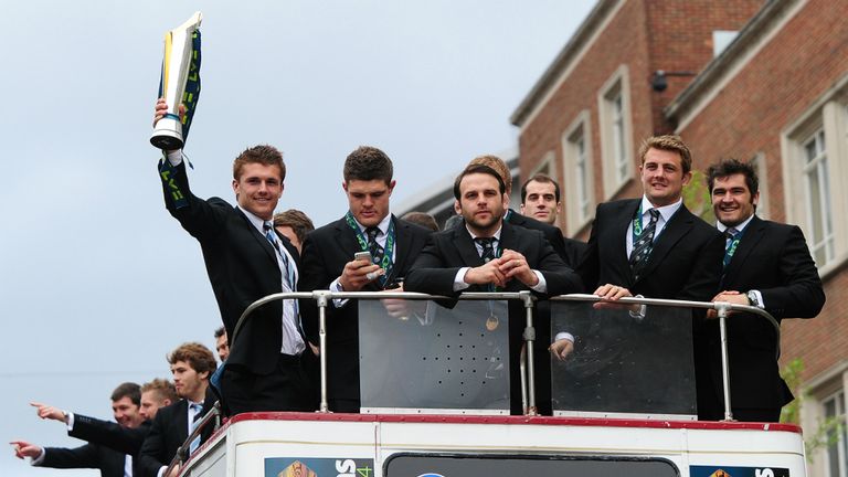 Henry Slade holds aloft the LV=Cup as the Chiefs parade through Exeter