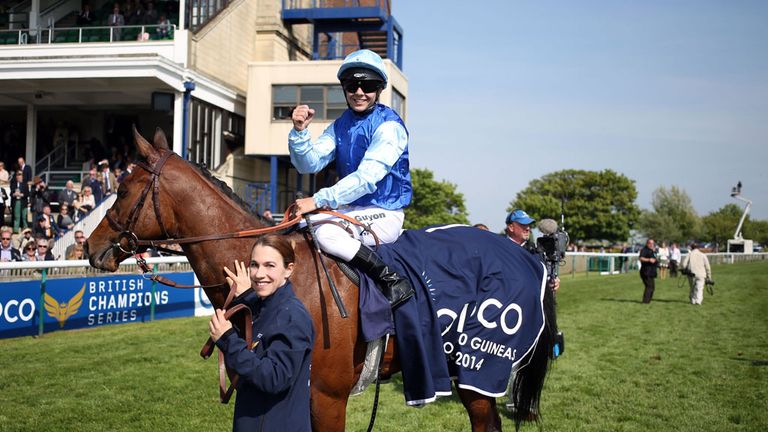 Miss France (centre) ridden by Maxime Guyon celebrates winning the Qipco 1000 Guineas stakes during day two of the 2014 QIPCO Guineas Festival at Newmarket