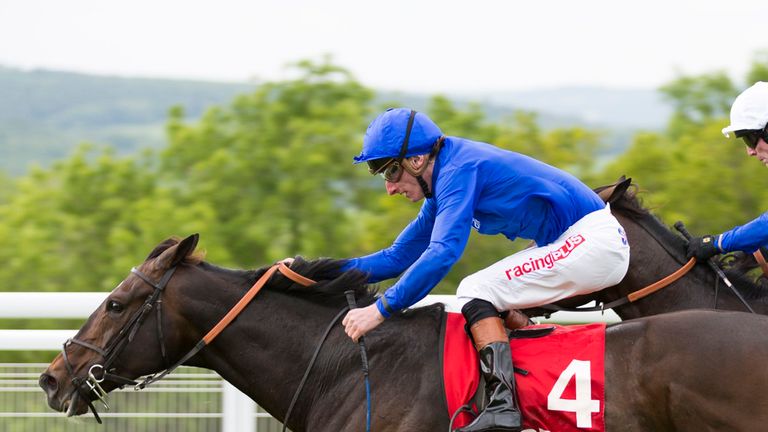 Jockey Adam Kirby on French Navy (left) wins the 32 Red Casino Stakes from Kieron Fallon on Windhoek during day three of the May Festival at Goodwood Racec