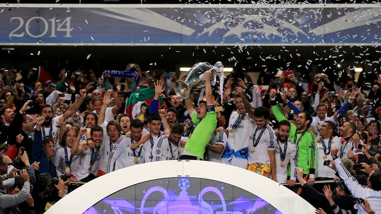 Real Madrid's Iker Casillas lifts the UEFA Champions League Trophy