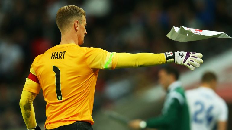 Jetting off: Hart probably had England's imminent flight to Miami in mind as he got rid of a paper plane from his box