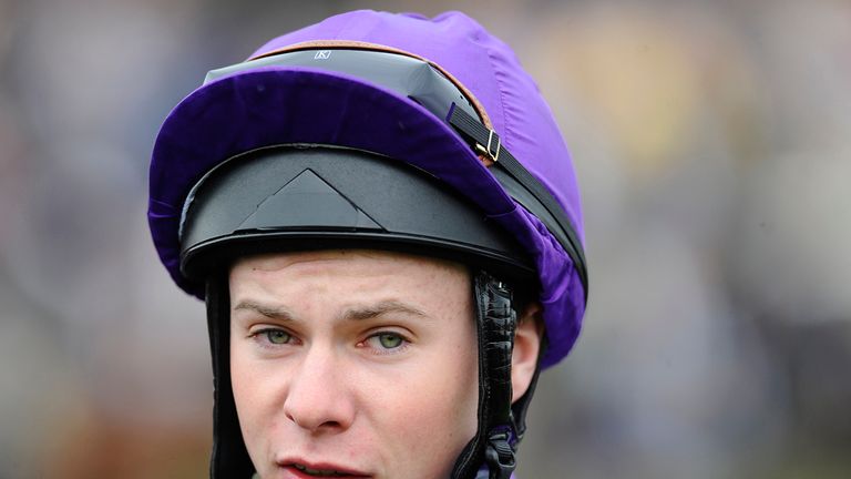 Joseph O'Brien poses at Newmarket racecourse on April 17, 2014 in Newmarket, England.