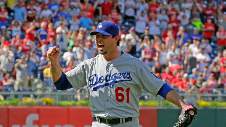 Starting pitcher Josh Beckett #61 of the Los Angeles Dodgers celebrates in the ninth inning after recording a no hitter