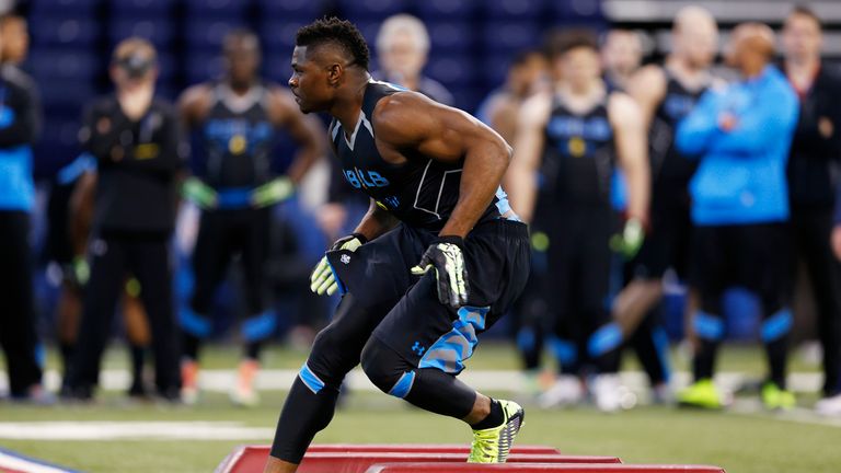 Former Buffalo linebacker Khalil Mack takes part in a position drill during the 2014 NFL Combine