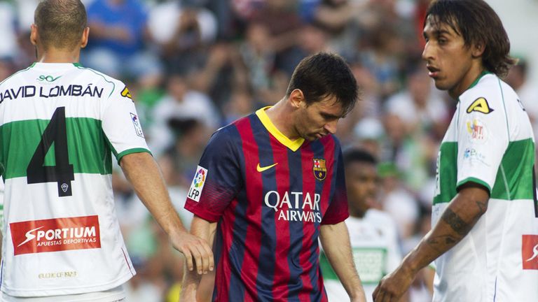 Barcelona forward Lionel Messi reacts against Elche