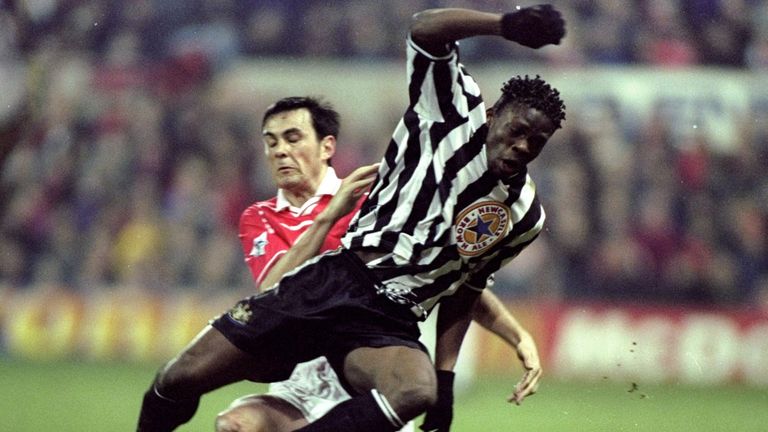 10 Mar 1999:  Louis Saha of Newcastle United is tackled by Steve Chettle of Nottingham Forest