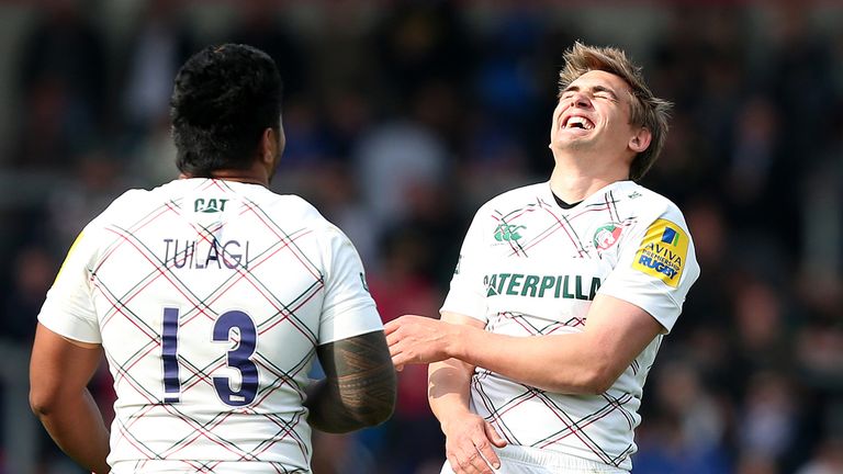 SALFORD, ENGLAND - MAY 03:  Toby Flood of Leicester Tigers shares a joke with Manu Tuilagi during the Aviva Premiership match between Sale Sharks and Leice