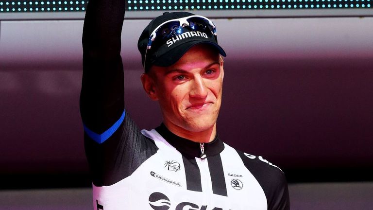 Stage winner Marcel Kittel of Giant-Shimano celebrates during the presentations after Stage two of the 2014 Giro D'Italia in Belfast.