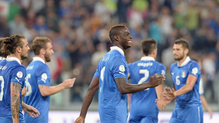 Mario Balotelli of Italy celebrates scoring the second goal during the 2014 World Cup qualifier against Czech Republic