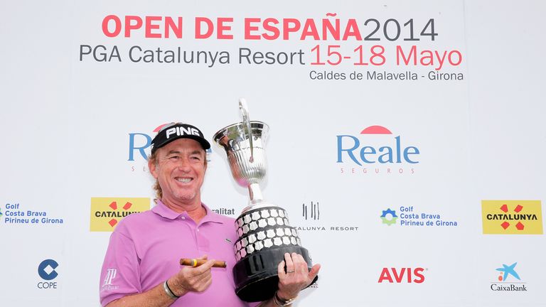 Miguel Angel Jimenez poses with the trophy after winning the Open de Espana held at PGA Catalunya