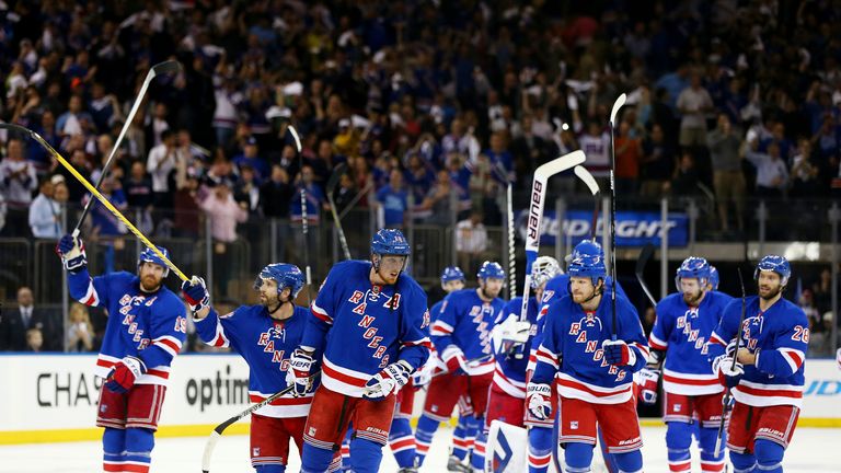 The New York Rangers celebrate their 3-1 win over the Pittsburgh Penguins in Game Six of the Eastern Conference semi-final