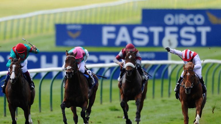 NEWMARKET, ENGLAND - MAY 03: Kieren Fallon riding Night Of Thunder (R) win The Qipco 2000 Guineas Stakes at Newmarket racecourse on May 03, 2014 in Newmark