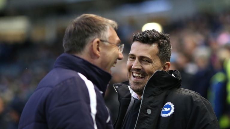 BRIGHTON, ENGLAND - JANUARY 04: Brighton manager Oscar Garcia and Reading manager Nigel Adkins share a joke during the FA Cup Third Round match between Bri