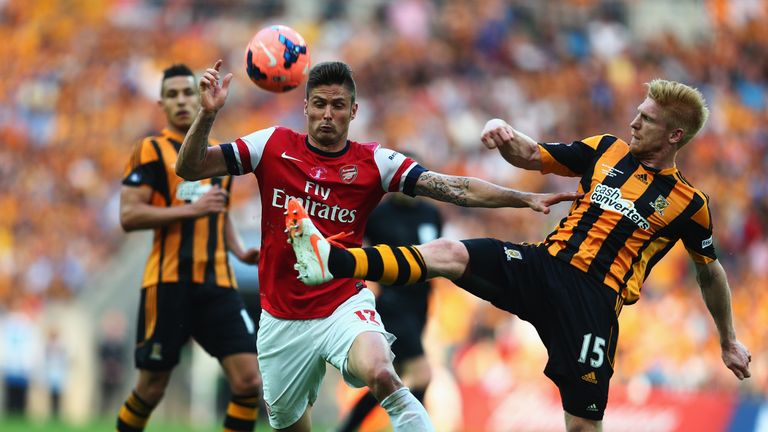 Olivier Giroud of Arsenal battles with Paul McShane of Hull City during the FA Cup final at Wembley